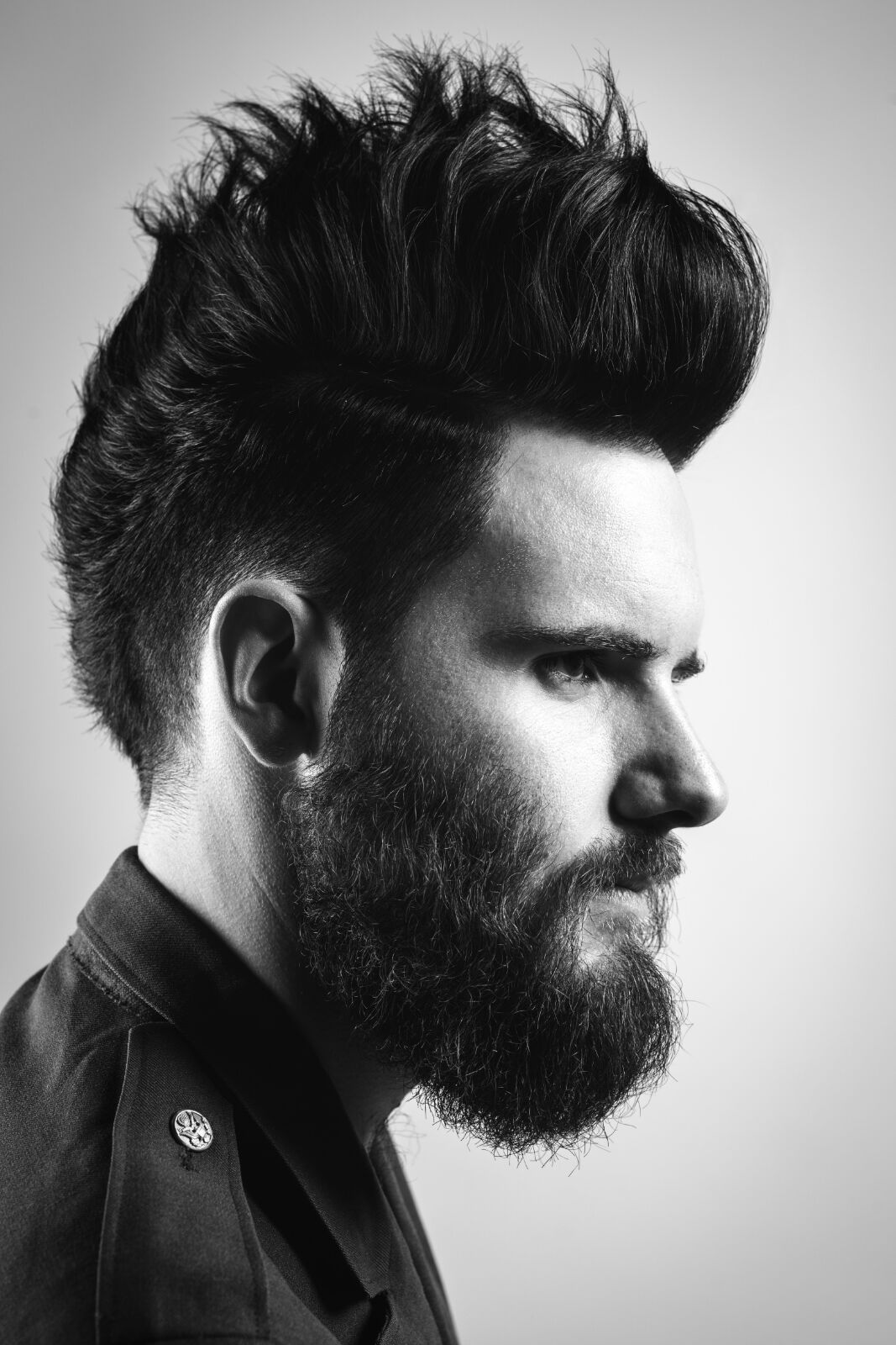 Black and white editorial profile, quiff and shaped beard